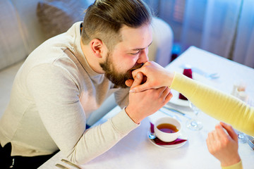 loving young couple drinking tea in the restaurant