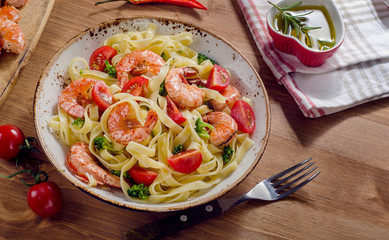 Pasta with shrimps and vegetables. Healthy eating.