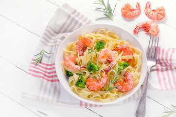 Pasta with shrimps and vegetables. Healthy diet food  concept.