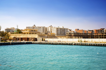 Fototapeta premium Egypt. Hurghada. View from the sea. New complexes under construction.2017.