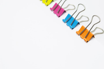 Colorful paper clips isolated on white background, Copy space.
