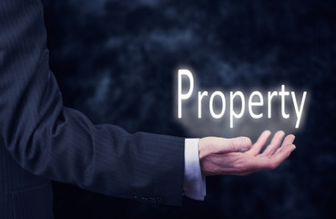 Hand holding a Property Concept