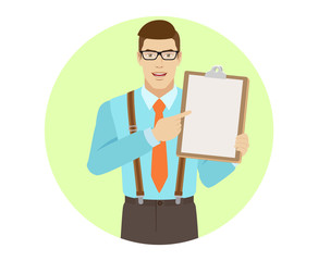 Businessman pointing at clipboard