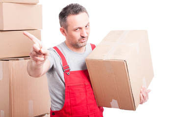 Portrait of mover man holding box showing denial gesture