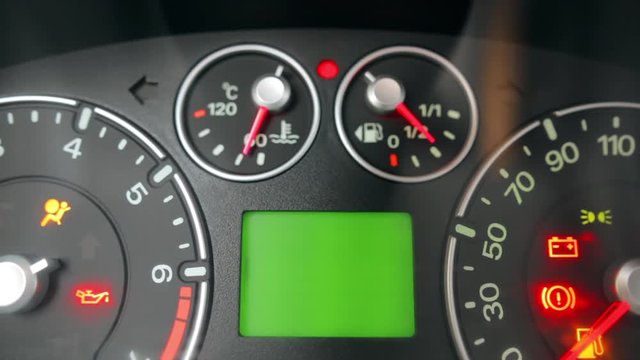 Close up image of a car's dashboard indicating a very high fuel consumption.