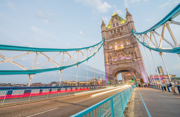 Fototapeta na wymiar LONDON - JUNE 2015: The Tower Bridge after sunset. London attracts 30 million tourists annually