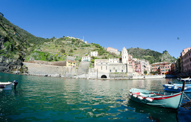 Fototapeta premium Colorful boats in the quaint port of Vernazza, Cinque Terre - Italy
