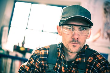 Worker in Protection Goggles