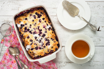 Cottage cheese casserole with peach and blueberry. Sweet food dessert.