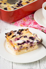 Cottage cheese casserole with peach and blueberry. Sweet food dessert.