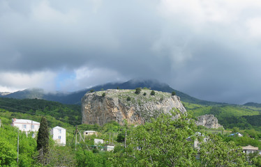 Fototapeta na wymiar Red Stone rock at Krasnokamenka village, Crimea