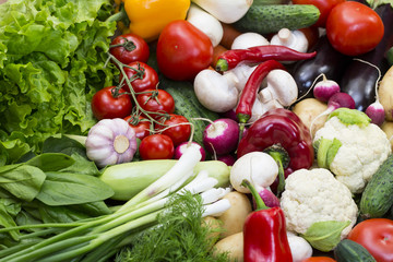 Background of fresh vegetables and greens closeup 