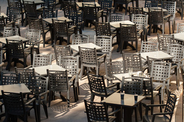 Tables and chairs in an empty Cafe