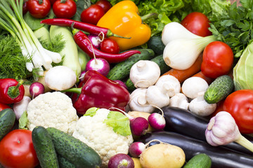 Background of fresh vegetables and greens closeup 