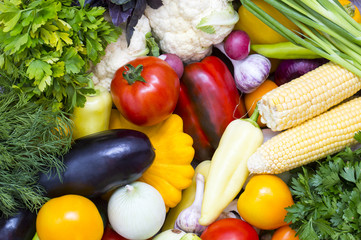Background of fresh vegetables and greens closeup 