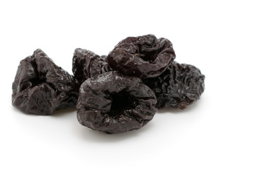 Prunes isolated on a white