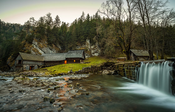 Old wooden water mill at National Nature Reserve Kvacianska dolina in Slovakia after sunset