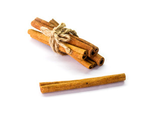 cinnamon sticks in a bundle on white isolated background