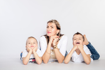 Mother with two kids on the floor