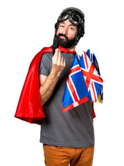 Superhero with a lot of flags making money gesture