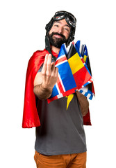 Superhero with a lot of flags coming gesture