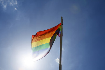 Rainbow flag on a flagpole