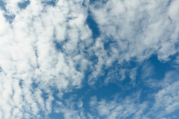 Fuzzy cloud in blue sky