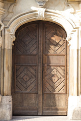 Fototapeta na wymiar Vintage wooden brown door close-up