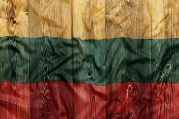 National flag of Lithuania, wooden background