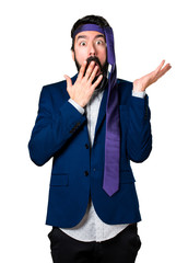 Crazy and drunk businessman making surprise gesture