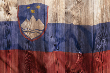 National flag of Slovenia, wooden background