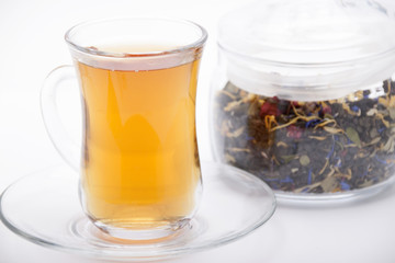 Picking of green tea with herbs and berries