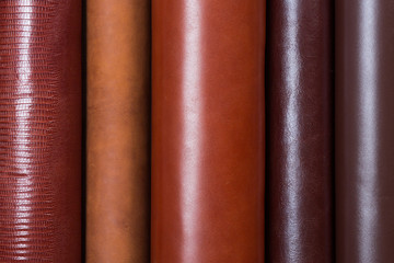 Beige leather rolls n vertical lines.
