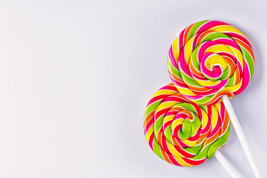The spiral lollipops on white background