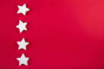 Stars isolated on red background. High resolution photo.