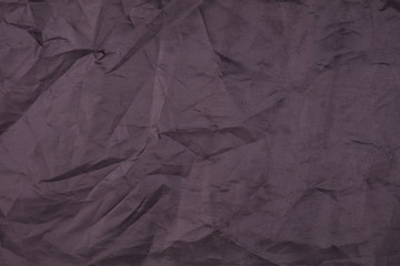 Vinous wrinkled paper background texture. High resolution photo.