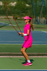 Tennis girl jumping rope