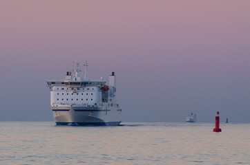 FERRY PASSENGER/CAR - The ferry on calm sea at sunset © Wojciech Wrzesień