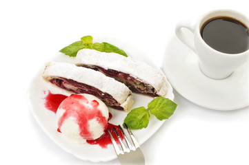 cherry strudel with ice cream and a cup of coffee