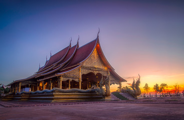 Fototapeta na wymiar Sirindhornwararam Temple (Phu Prao Temple), Ubon Ratchathani at twilight time,Thailand