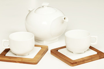 White cup and teapot fot tea or coffee