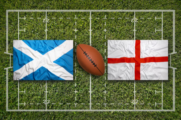 Scotland vs. England flags on rugby field