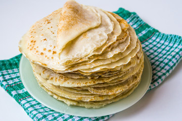 Thin pancakes on a plate