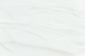 Cosmetics. Cream white background texture.