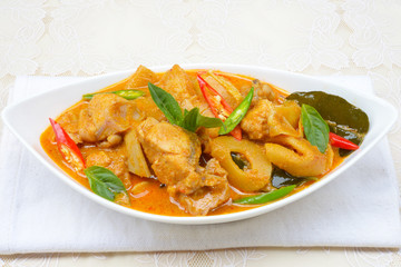 spicy bamboo shoot with chicken in coconut cream and red curry
