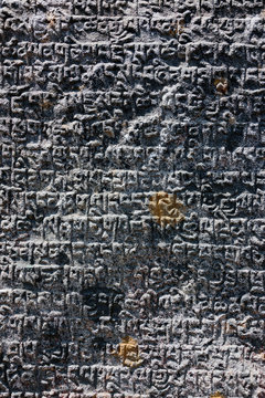 Ancient stones carved with the buddhist mantras near Khumjung - Nepal, Himalayas