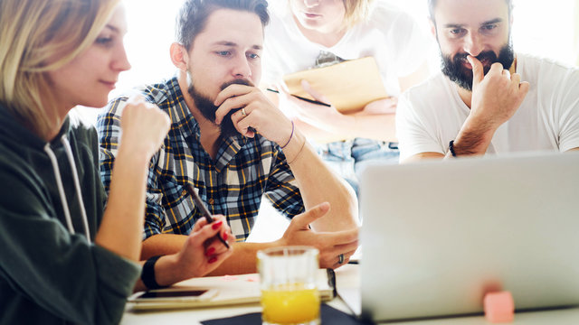 Financial analysts are discussing the income rates from the new business project promotion. International students are analyzing the materials for the upcoming exameation.