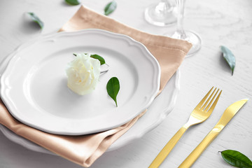 Table setting on wooden background