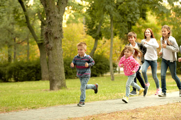 Sporty children running in the park