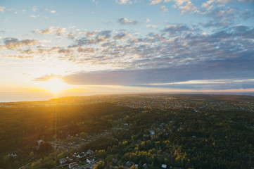 Fototapeta na wymiar Sunset over Tallinn city suburbs and Baltic sea, Estonia